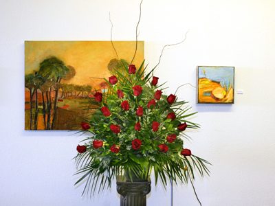 Red rose funeral arrangement