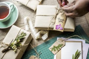 Photo of dried flowers used in wrapping gifts as a creative use for dried flowers.