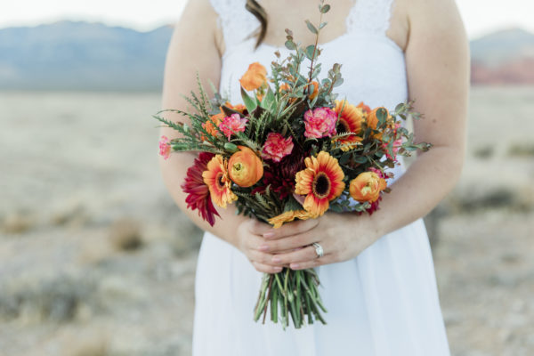 Custom wedding bouquet with orange and pink flowers