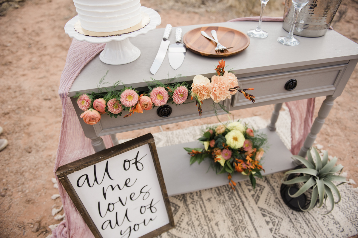 Reception table aligned with roses