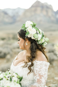 Wedding Florist Las Vegas Bride with wedding headpiece made of white flowers and greenery.
