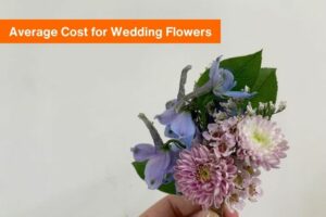 Small group of pink and purple wedding flowers next to the text 'average cost for wedding flowers".