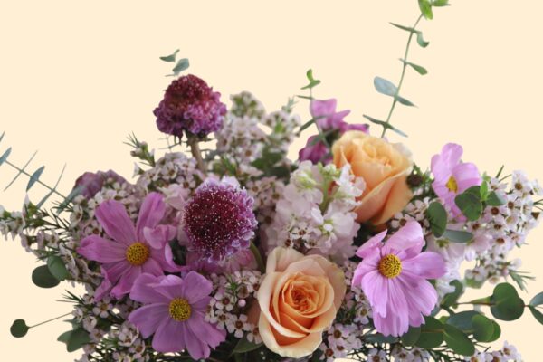 flowers of soft lavender and warm peach tones